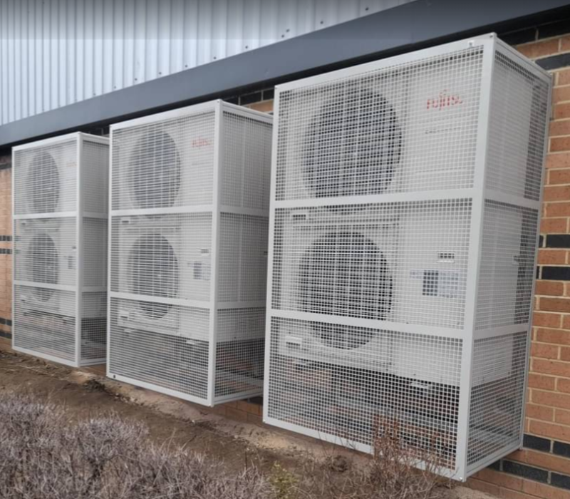 Fujitsu air conditioning units with guards on commercial unit